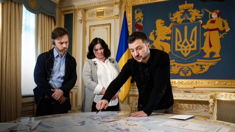 Ukrainian President Volodymyr Zelenskyy shows Reuters journalists a map of strategic resources at his office in Kyiv, Ukraine, on Feb. 7, 2025. The United States and Ukraine signed a long-delayed minerals deal on April 30. Alentyn Ogirenko/Reuters